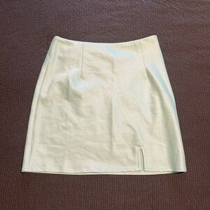Princess Polly green mini skirt